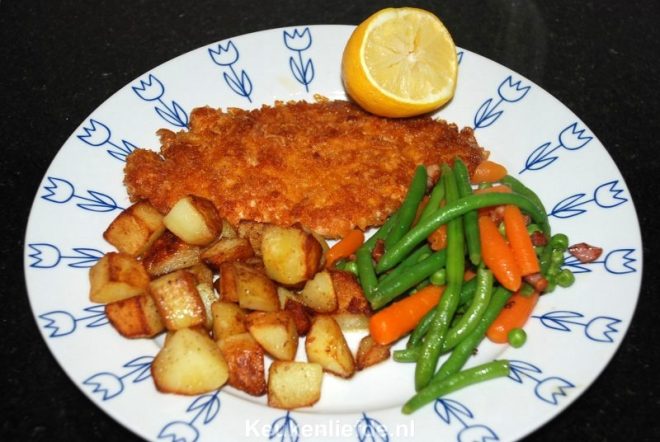 Kipschnitzel in krokant Parmezaanjasje