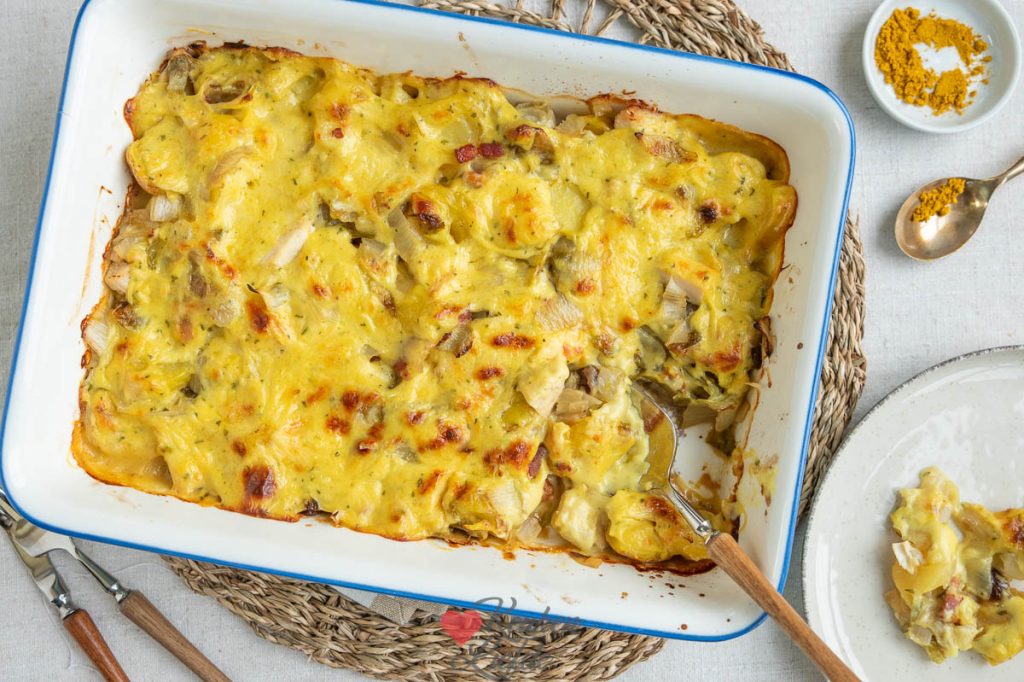 Witlof ovenschotel met kip, krieltjes en kerriesaus