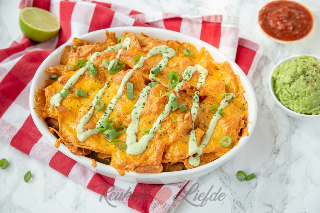 Bij naam Resistent galerij Mexicaanse ovenschotel met kip en nacho's | Keukenliefde
